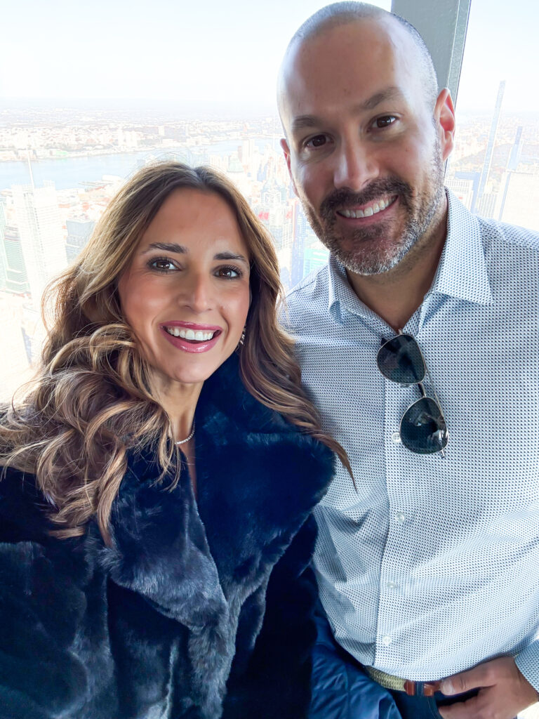 Smiling couple in Empire State Building