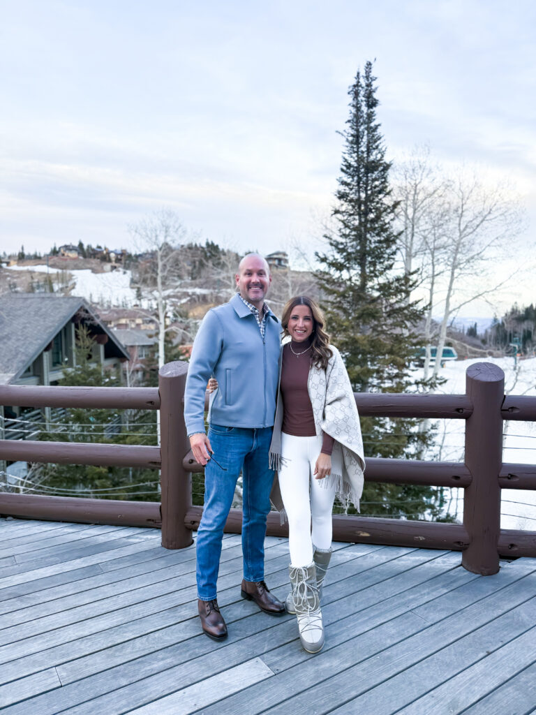 couple posing before dinner at Alpenglobes in Park City