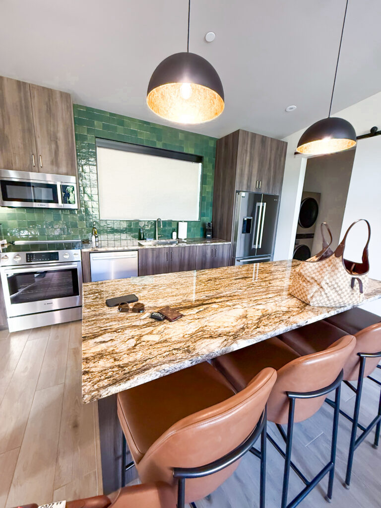 Indoor view of kitchen area in a 2 bed/2 bathroom villa at Montclair at Xion